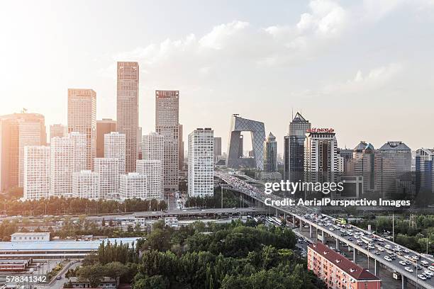 beijing urban skyline - cctv headquarters stock pictures, royalty-free photos & images