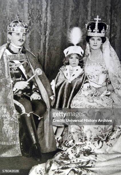 Photographic portrait of Zita of Bourbon-Parma , Emperor Charles I of Austria and their eldest son Crown Prince Otto von Hasburg after the Coronation...