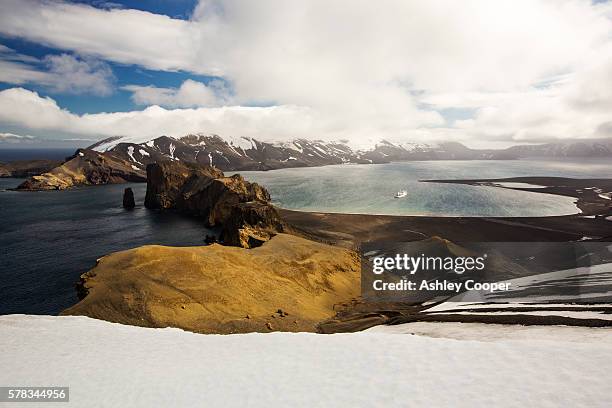 deception island in the south shetland islands off the antarctic peninsular is an active volcanic caldera. - south shetland islands stockfoto's en -beelden