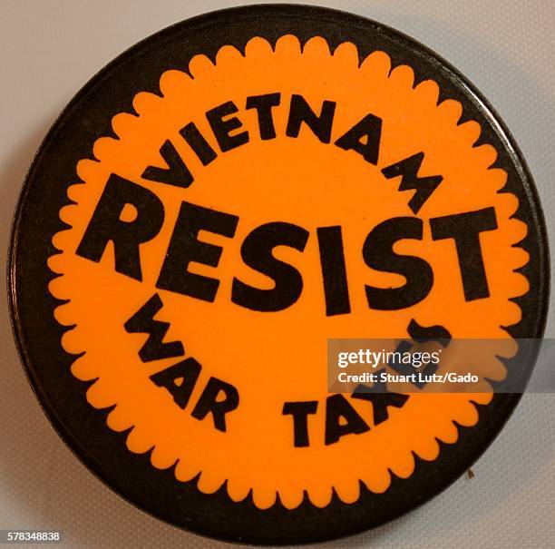 Protest pin that reads 'Resist Vietnam War taxes', it was created due to the public backlash against congressional approval of President Johnson's...