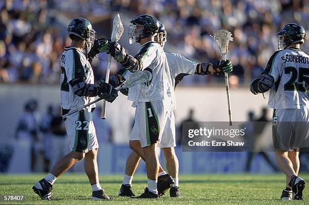 Gary Gait and Casey Powell of the Long Island Lizards are on the field during the Major League Lacrosse game against the Boston Cannons at Cawley...