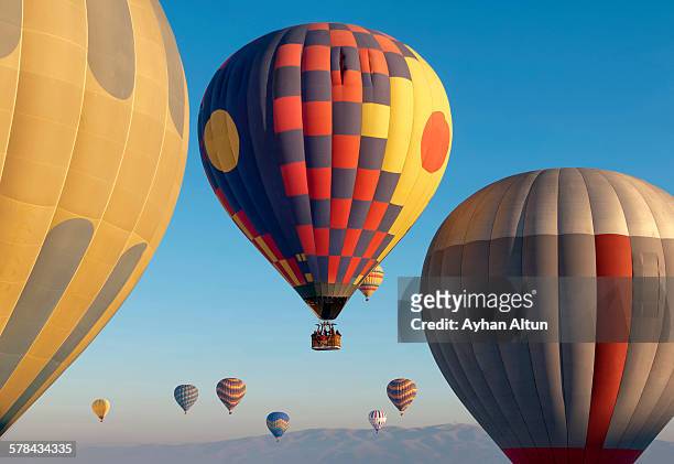 hot air ballooning - cappadocia hot air balloon stock-fotos und bilder