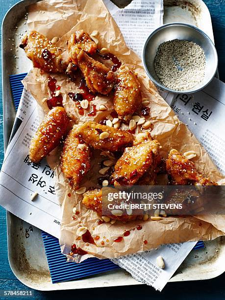 dakgangjeong, a korean fried chicken dish - koreaanse cultuur stockfoto's en -beelden