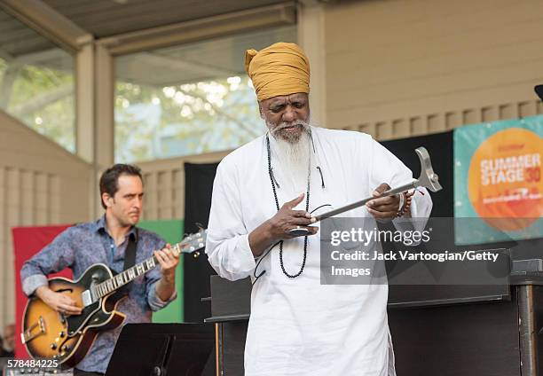American musician Dr Lonnie Smith plays his custom-made 'slap-stick' to close the second day of the 23rd Annual Charlie Parker Jazz Festival in the...