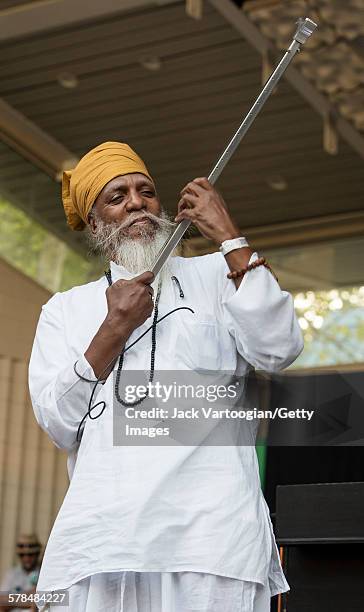 American musician Dr Lonnie Smith plays his custom-made 'slap-stick' to close the second day of the 23rd Annual Charlie Parker Jazz Festival in the...