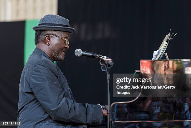 American Jazz musician Andy Bey plays piano as he performs on the second day of the 23rd Annual Charlie Parker Jazz Festival in the Richard Rodgers...