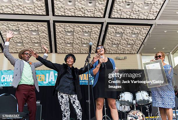 Ninty-five year-old American Lindy Hop dancer Norma Miller receives a proclamation from Diana Howard , of Manhattan Borough President Gale Brewer's...