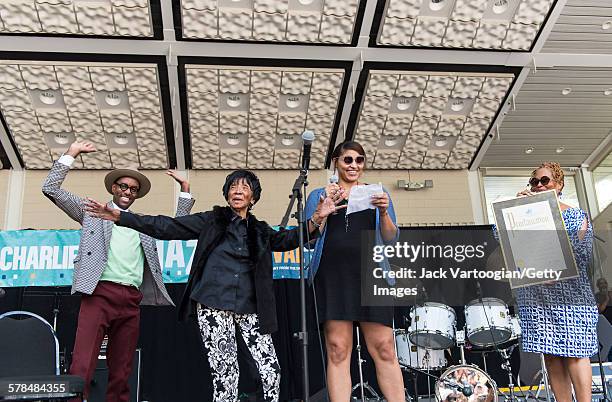 Ninty-five year-old American Lindy Hop dancer Norma Miller receives a proclamation from Diana Howard , of Manhattan Borough President Gale Brewer's...