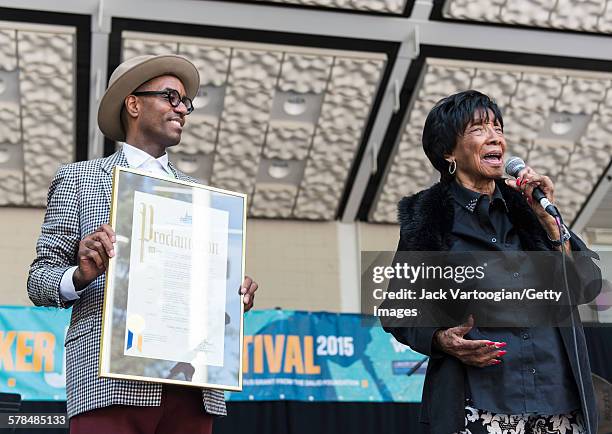 Ninty-five year-old American Lindy Hop dancer Norma Miller receives a proclamation , held by her protege Samuel Coleman, on the second day of the...