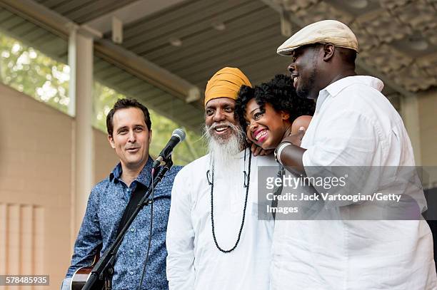 American musician and bandleader Dr Lonnie Smith and his band take a bow on the second day of the 23rd Annual Charlie Parker Jazz Festival in the...