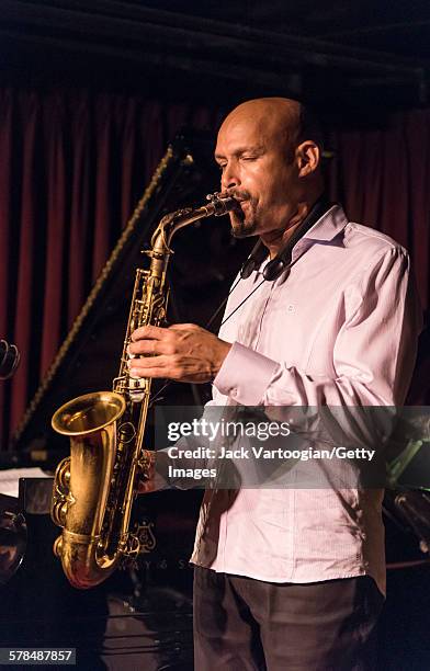 Puerto Rican American Jazz musician Miguel Zenon plays alto saxophone as he leads his quartet at the Village Vanguard, New York, New York, September...