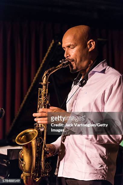 Puerto Rican American Jazz musician Miguel Zenon plays alto saxophone as he leads his quartet at the Village Vanguard, New York, New York, September...