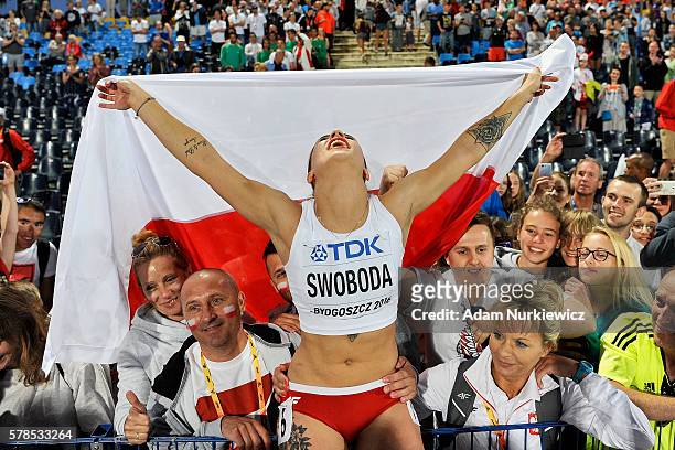 Ewa Swoboda from Poland celebrates among fans her silver medal in women's 100 meters while the IAAF World U20 Championships - Day 3 at Zawisza...