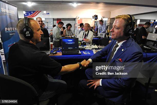 Gregory Angelo, President of Log Cabin Republicans, shakes hands with Andrew Wilkow following a live broadcast of The Wilkow Majority on SiriusXM...