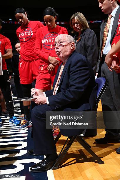 Head coach, Mike Thibault of the Washington Mystics huddles after a play against the San Antonio Stars on June 29, 2016 at the Verizon Center in...