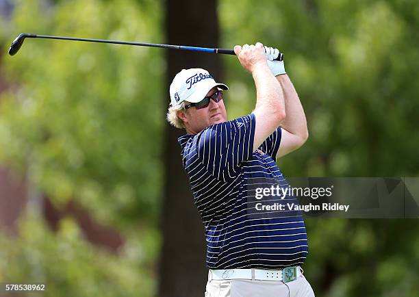 Brad Fritsch of Canada watches his tee shot on the sixth hole during the first round of the RBC Canadian Open at Glen Abbey Golf Club on July 21,...