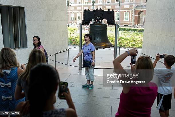 People visit the Liberty Bell, July 21, 2016 in Philadelphia, Pennsylvania. The Democratic National Convention will formally kick off in Philadelphia...