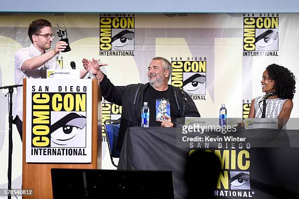 Moderator Josh Horowitz presents award to director Luc Besson and producer Virginie Besson-Silla at the "Valerian And The City Of A Thousand Planets"...