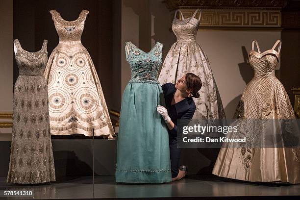 Outfits worn by Queen Elizabeth II are displayed during a photocall at Buckingham Palace on July 21, 2016 in London, England. The piece makes up part...