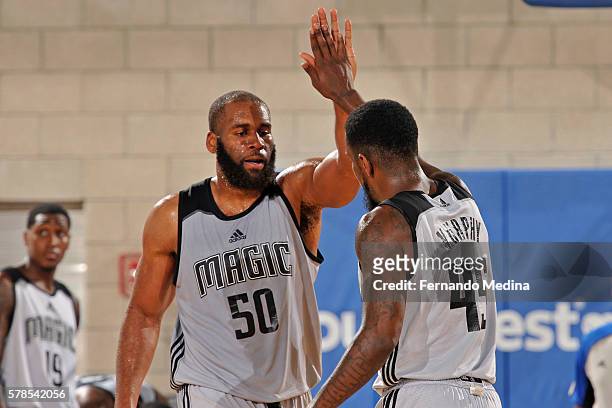 Arinze Onuaku and Kevin Murphy of Magic White celebrates against the Dallas Mavericks during the 2016 Orlando Summer League on July 4, 2016 at Amway...