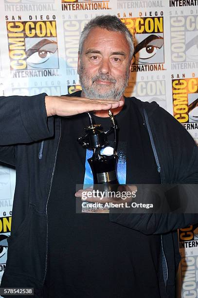 Director Luc Besson with his Inkpot Award attends the "Valerian And The City Of A Thousand Planets" panel during Comic-Con International 2016 at San...