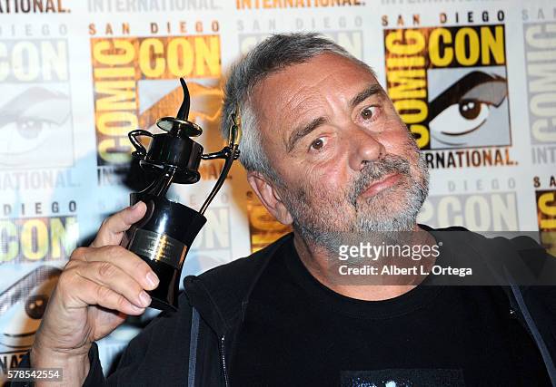 Director Luc Besson with his Inkpot Award attends the "Valerian And The City Of A Thousand Planets" panel during Comic-Con International 2016 at San...