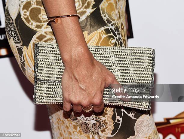 Actress Shawna Craig, clutch detail, arrives at the opening of "Cabaret" at the Hollywood Pantages Theatre on July 20, 2016 in Hollywood, California.