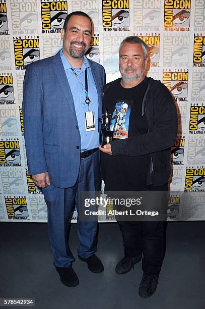 Comic-Con International Director of Programming Eddie Ibrahim and director Luc Besson, recipient of the Inkpot Award, attend the "Valerian And The...