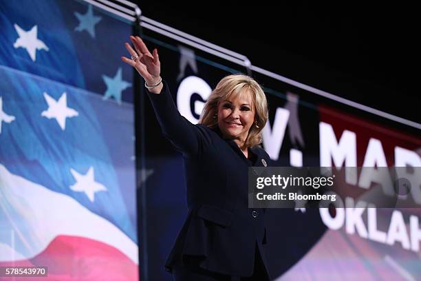 Mary Fallin, governor of Oklahoma, waves while arriving on stage during the Republican National Convention in Cleveland, Ohio, U.S., on Thursday,...