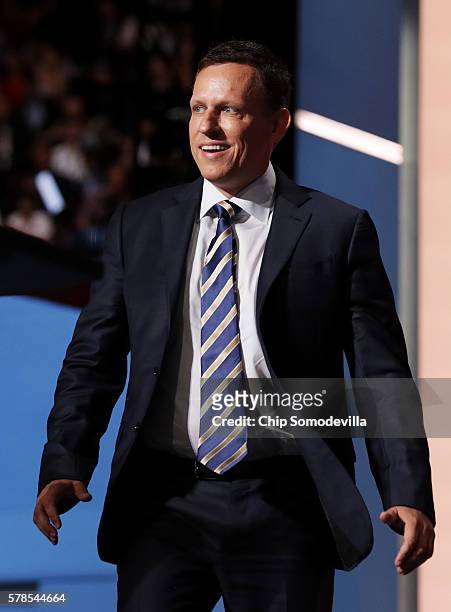 Peter Thiel, co-founder of PayPal, walks on stage to deliver a speech during the evening session on the fourth day of the Republican National...