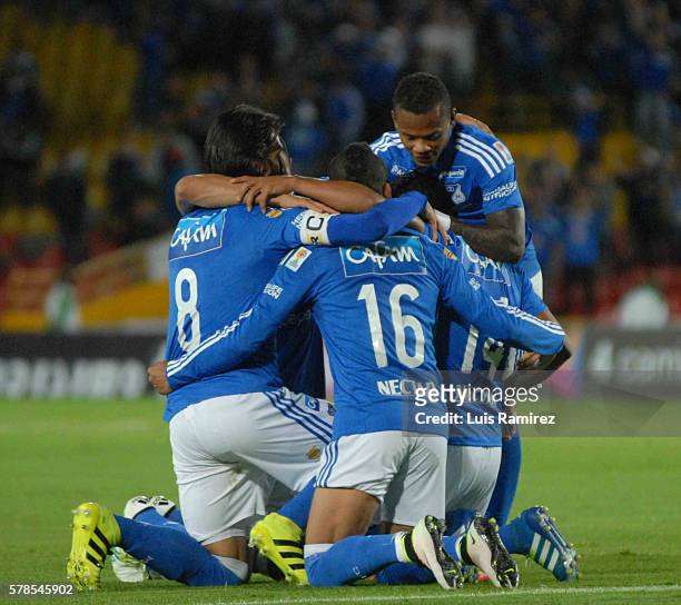 David Silva of Millonarios celebrates with teammates after scoring the opening goal during a match between Millonarios and Once Caldas as part of...