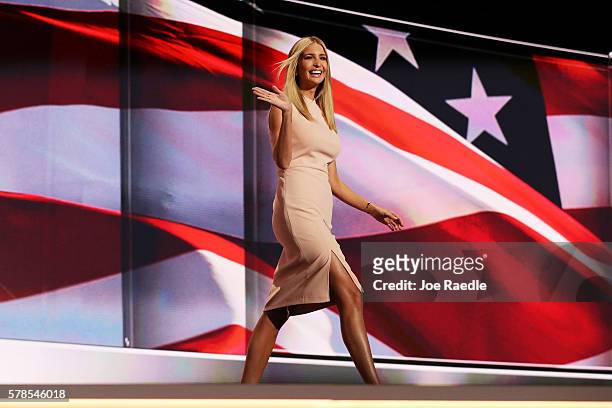 Ivanka Trump waves to the crowd as she walks on stage to deliver a speech during the evening session on the fourth day of the Republican National...