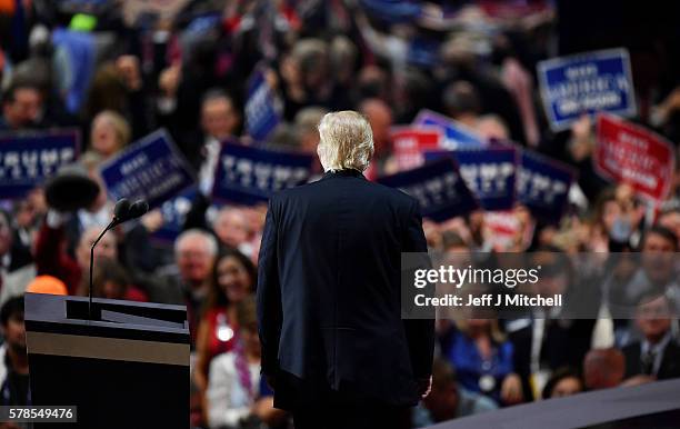 Republican presidential candidate Donald Trump pauses during his speech on the fourth day of the Republican National Convention on July 21, 2016 at...