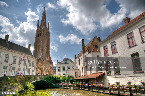 bruges - the tower of the church of our lady. - church of our lady bruges stock pictures, royalty-free photos & images