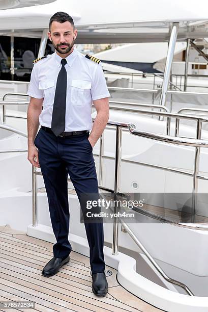 attractive ship captain - kapitein stockfoto's en -beelden