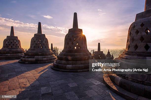 sunrise at borobudur, magelang, central java, indonesia - borobudur temple stock pictures, royalty-free photos & images