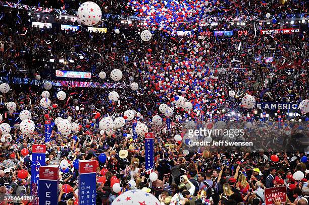 Balloons fall over the crowd after Republican presidential candidate Donald Trump delivered his speech on the fourth day of the Republican National...