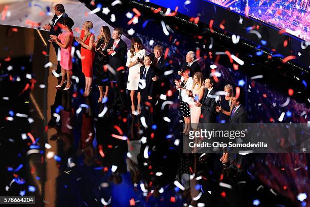 Republican presidential candidate Donald Trump and Republican vice presidential candidate Mike Pence stand with their families at the end of the...