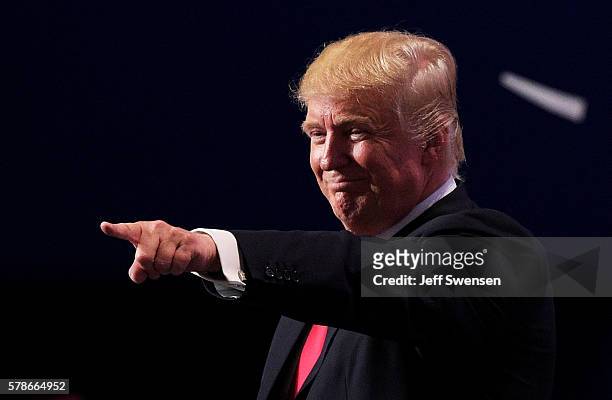 Republican presidential candidate Donald Trump gestures at the end of the Republican National Convention on July 21, 2016 at the Quicken Loans Arena...