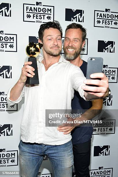 Actors Ian Bohen and JR Bourne pose with Fandom of the Year award backstage at the MTV Fandom Awards San Diego at PETCO Park on July 21, 2016 in San...