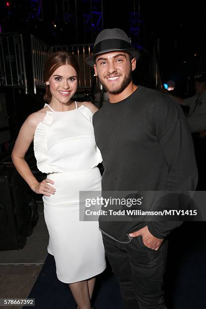 Actors Holland Roden and Cody Christian pose backstage the MTV Fandom Awards San Diego at PETCO Park on July 21, 2016 in San Diego, California.