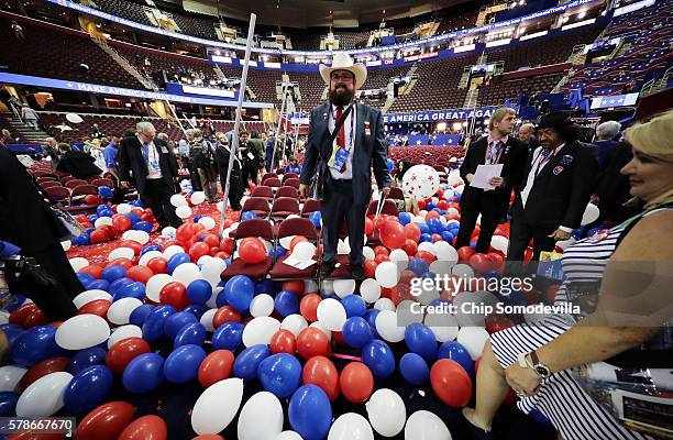 People walk along the ramp at the end of the fourth day of the Republican National Convention on July 21, 2016 at the Quicken Loans Arena in...