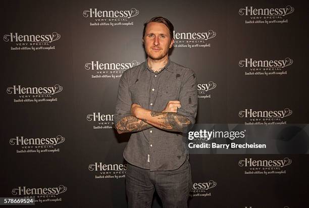 American artist and tattoo artist Scott Campbell walks the carpet during the Hennessy V.S Limited Edition by Scott Campbell Bottle Launch on July 21,...