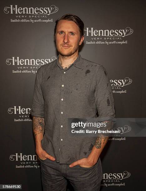 American artist and tattoo artist Scott Campbell walks the carpet during the Hennessy V.S Limited Edition by Scott Campbell Bottle Launch on July 21,...