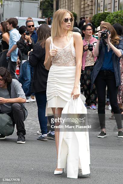 Elena Perminova leaves the Christian Dior Haute Couture Fall/Winter 2016-2017 show as part of Paris Fashion Week on July 4, 2016 in Paris, France.