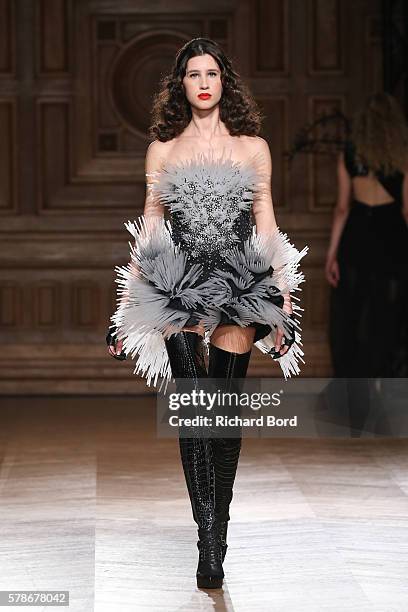 Model walks the runway during the On Aura Tout Vu Haute Couture Fall/Winter 2016-2017 show as part of Paris Fashion Week on July 4, 2016 in Paris,...