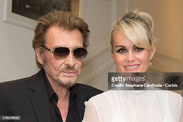 Johnny Hallyday and Laeticia Hallyday attend the Christian Dior Haute Couture Fall/Winter 2016-2017 show as part of Paris Fashion Week on July 4,...