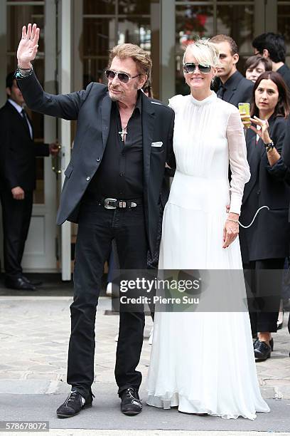 Johnny Hallyday and Laeticia Hallyday arrive at the Christian Dior Haute Couture Fall/Winter 2016-2017 show as part of Paris Fashion Week on July 4,...