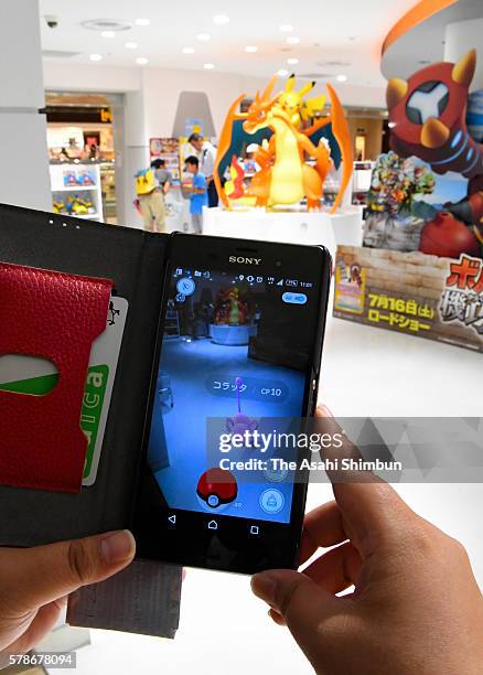 Pokemon Go player at the Pokemon Center Mega Tokyo on July 22, 2016 in Tokyo, Japan. Japanese players started downloading "Pokemon Go" following...