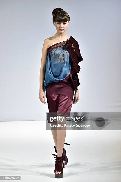 Model walks the runway during the Patuna Haute Couture Fall/Winter 2016-2017 show as part of Paris Fashion Week on July 4, 2016 in Paris, France.